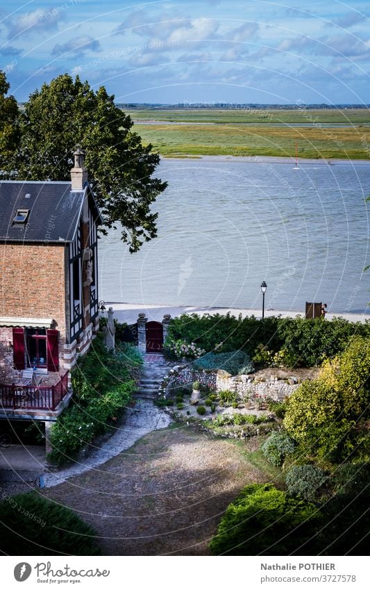 View of Baie de Somme, LeCrotoy, from the heights of Saint-Valery view bay water sky house trees view from above far horizon saint valery baie de somme