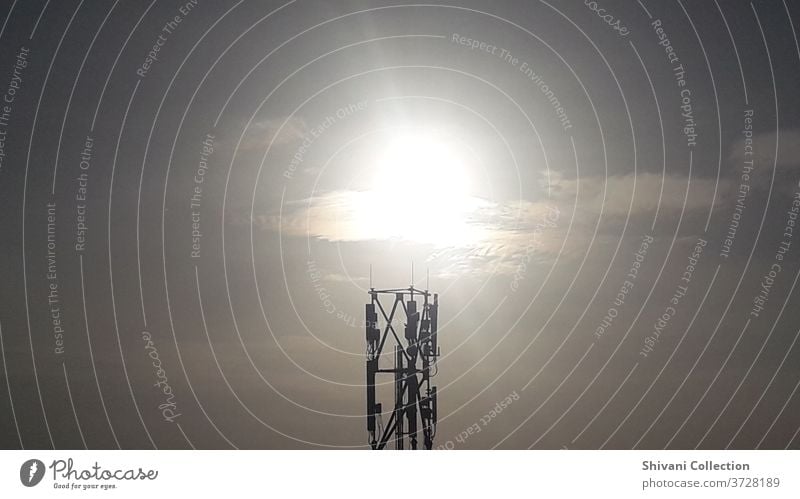 Telecommunication tower with sunrise moments with clouds sky background. Copy space nature and technology concepts. Antenna Beautiful scenery broadcast