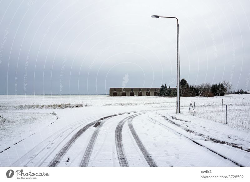 Sad area Village Sky Real estate Fence daylight Copy Space top Deserted Loneliness Colour photo Exterior shot Calm Barracks garages Light pole Street lighting