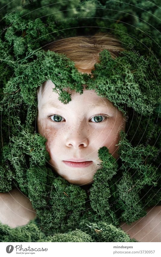 Girl in the moss - a Royalty Free Stock Photo from Photocase
