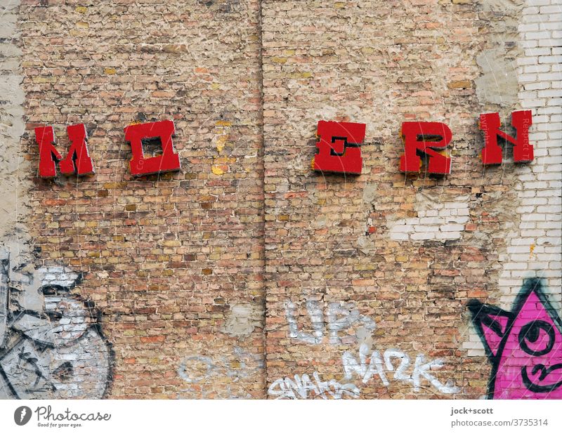MODERN without D Fire wall Wall (building) Street art Creativity Word Subculture Typography Style Graffiti Letters (alphabet) Uniqueness Weathered Modern Old