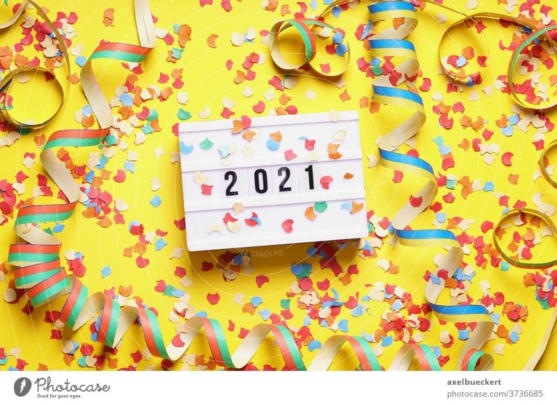 2021 new year celebration flat lay concept with confetti new years eve party paper streamer happy new year messy top view decoration background festive holiday