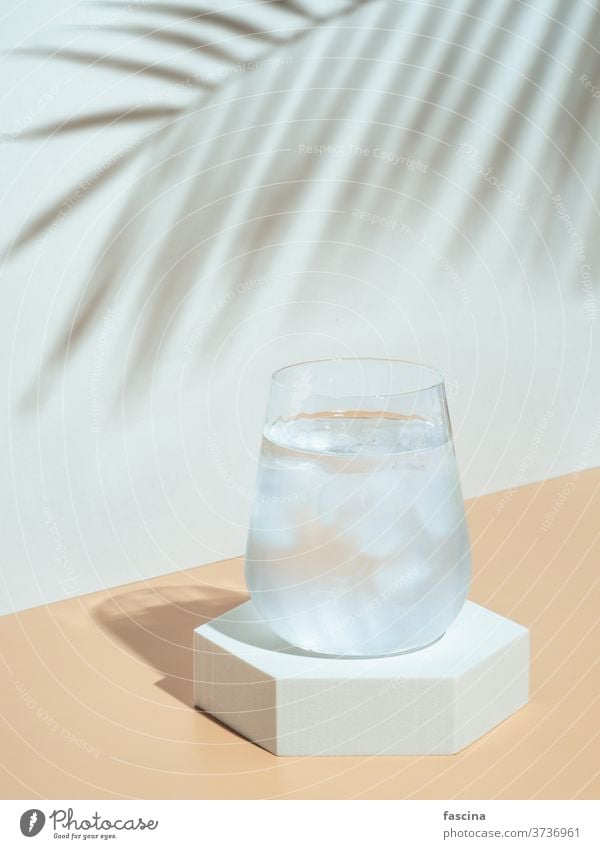 Modern still life with cold water glass - a Royalty Free Stock