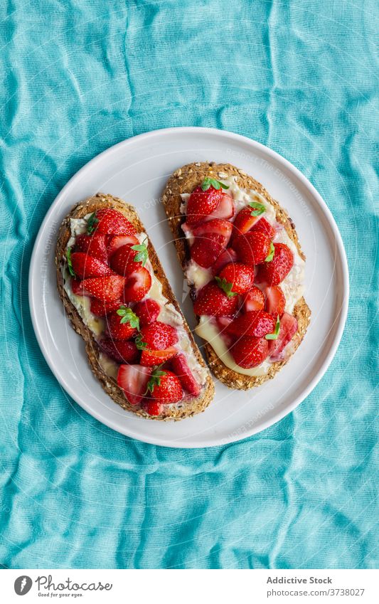 Delectable sweet toasts with strawberry bread fresh breakfast honey yummy food dessert snack meal plate delicious tasty serve homemade morning organic dish