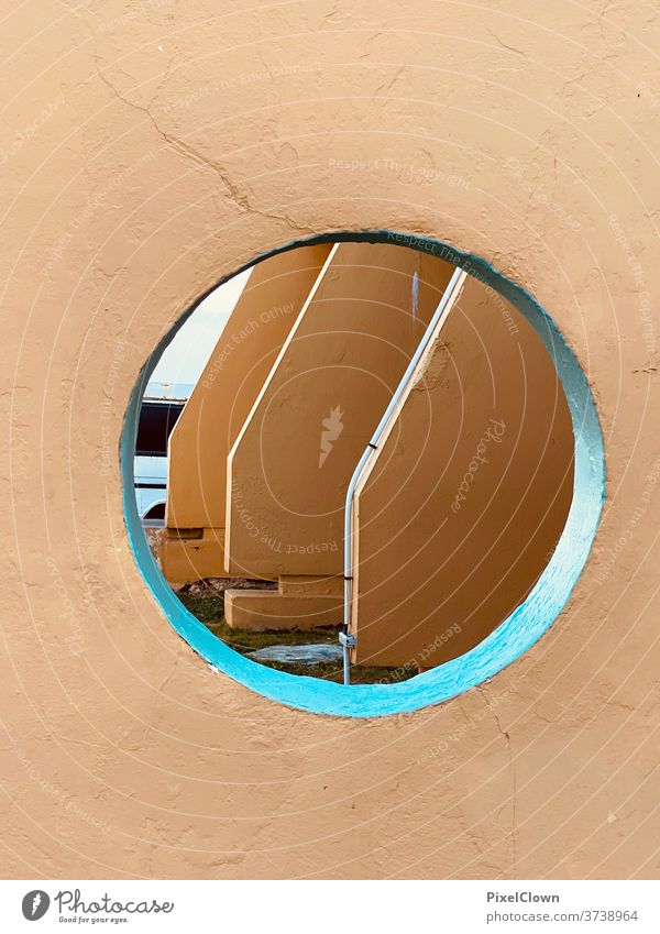 View through the wall Wall (barrier) Wall (building) Exterior shot Facade built Porthole Window Gloomy Architecture Yellow House (Residential Structure)