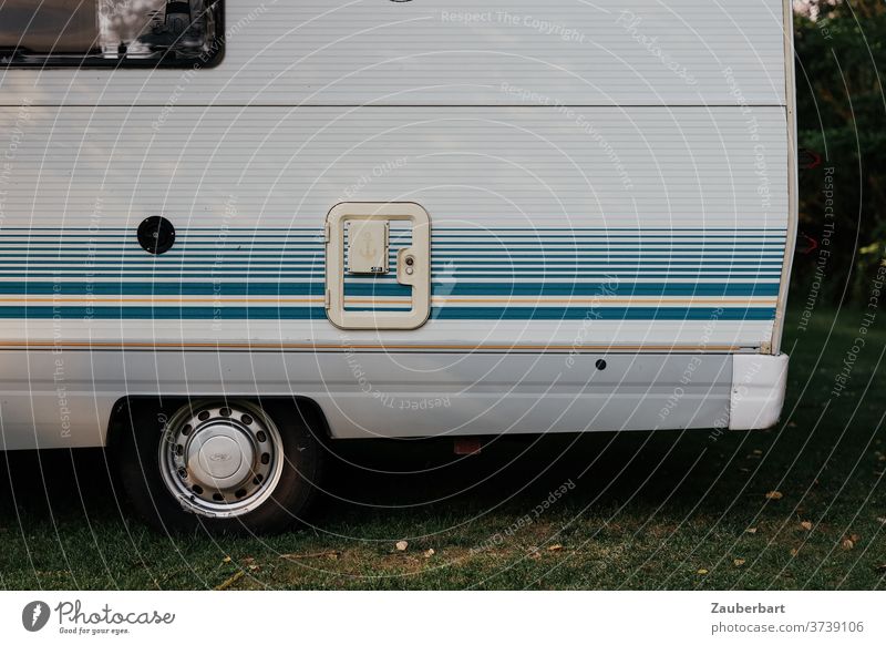 Side view of a motorhome with blue stripes Mobile home Caravan Wheel Stripe Blue side view Camping Camping site vanlife caravan vacation voyage Tourism overflow