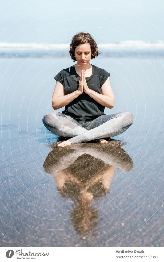 Calm Slim Woman Practicing Yoga Meditating Stock Photo 2297369763