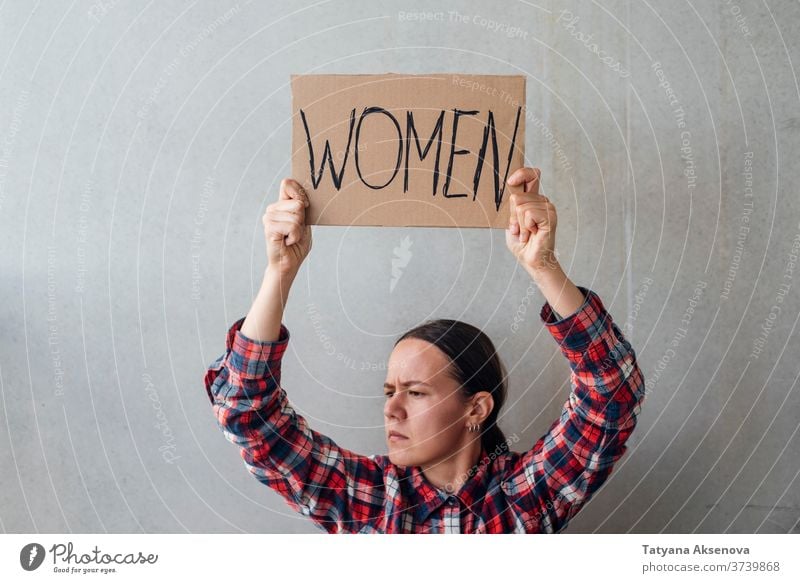 Woman activist with poster women rights banner demonstration protest people politics human gender street community equality female protester sign demonstrator