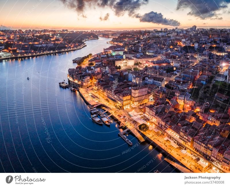 Aerial view of city center of Porto at the evening, Portugal douro porto portugal aerial cityscape ribeira night boat house architecture old windows old town