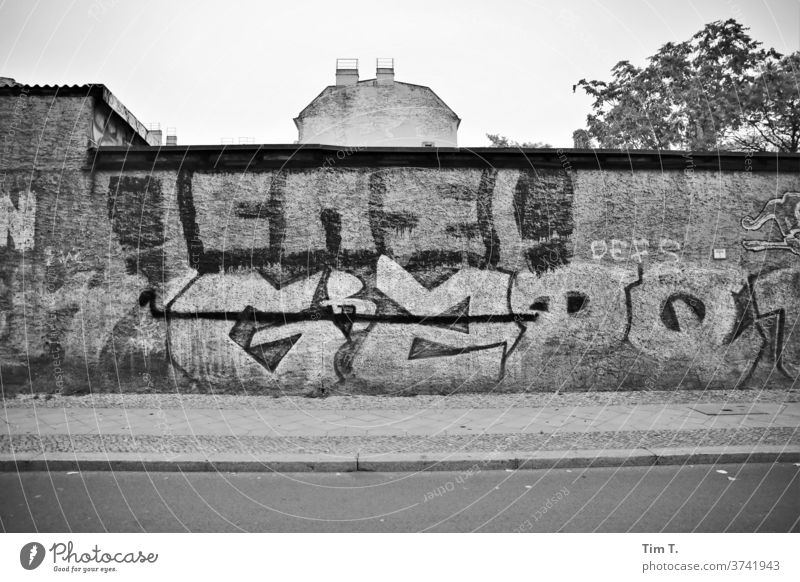 Berlin Lichtenberg is still special Graffiti Black & white photo Town Exterior shot Capital city Day Deserted Downtown Old town House (Residential Structure)