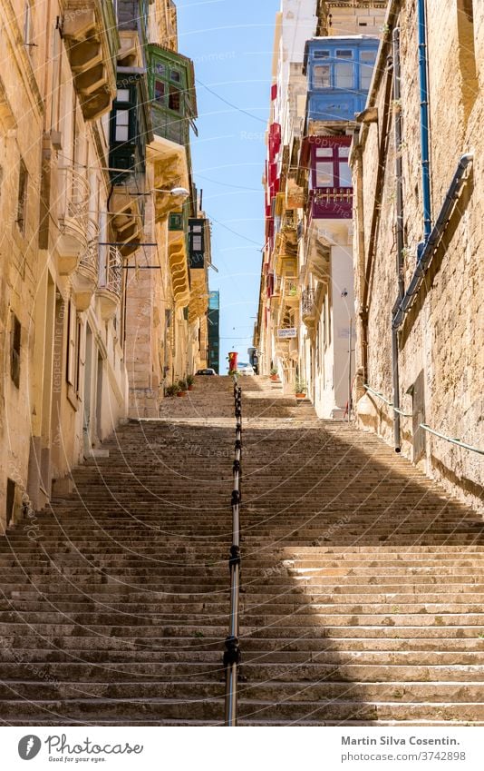 Street of Valleta, Malta's capital. Cityscapein Sunny Day. architecture bay blue building cathedral church city cityscape dome europe european harbor harbour
