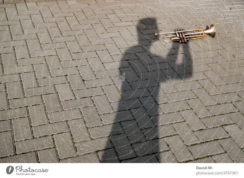 Shadow player - man plays trumpet Music Musician Culture Art Artist Musical instrument corona Human being interdiction creatively Trumpeter