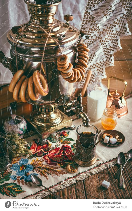 https://www.photocase.com/photos/3747696-samovar-russian-tea-drinking-culture-food-retro-photocase-stock-photo-large.jpeg