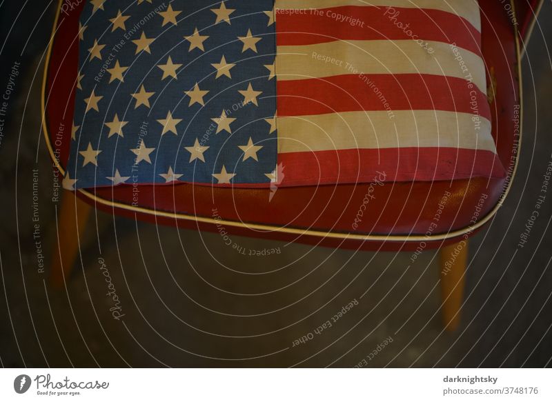 Chair with cushion and flag of the United States of America National Flag USA Americas stars Stripe Freedom Blue Symbols and metaphors Patriotism patriotically