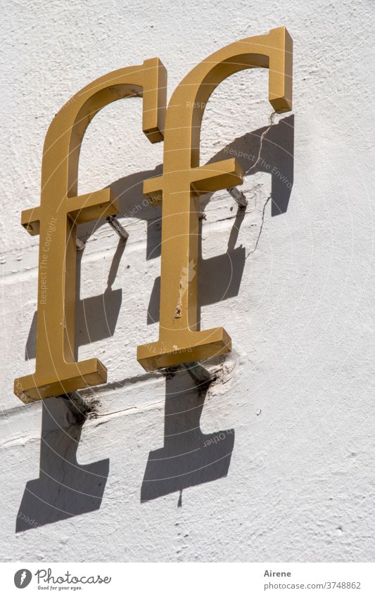 effeff letter Letters (alphabet) FF Gold golden Shadow writing Inscription Heading Italic obliquely Relief house wall Shop Load Storefront pamphlet Serif Metal