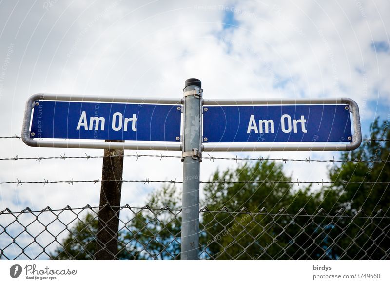 "On the spot", 2 Indian, extraordinary street signs which can be valid individually everywhere. Fence with barbed wire Road signs Exceptional on the spot Site