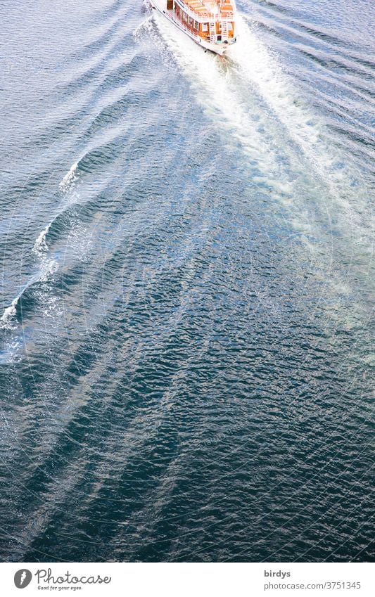 wake of an excursion ship in bird's eye view, stern of the ship in section, waves and turbulences Wake Motorboat Swirls Waves trace Water Navigation Waterways