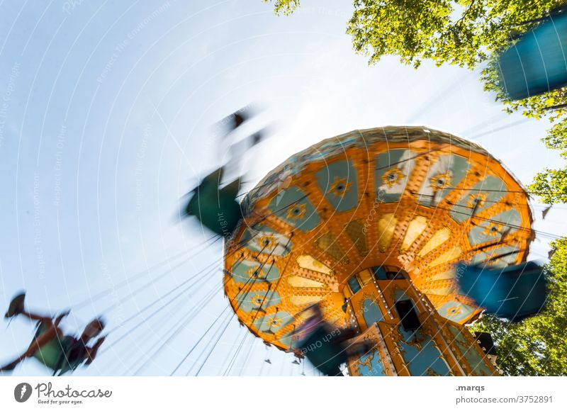 3500 rpm. Chairoplane Carousel funfair Leisure and hobbies Lifestyle Joy Fairs & Carnivals Rotate Vertigo Motion blur Happiness Movement Amusement Park Euphoria