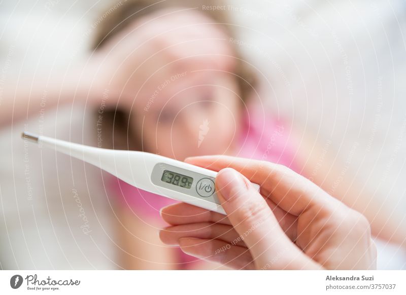 Free Photo  Medical thermometer indicating high temperature on