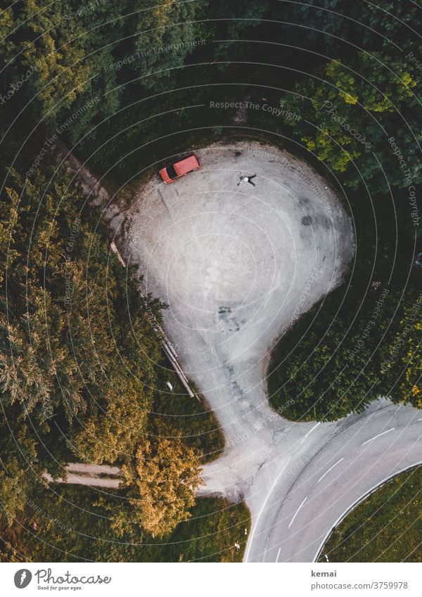 Car and man from above car Caddy Camping Wild camping Lie Parking lot Human being snow angels surface UAV view Bird's-eye view Forest green tree Nature