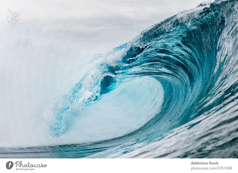 Stormy turquoise sea with waves ocean power water nature landscape blue seascape coast surf tropical crest summer splash white foam seashore surface storm wet