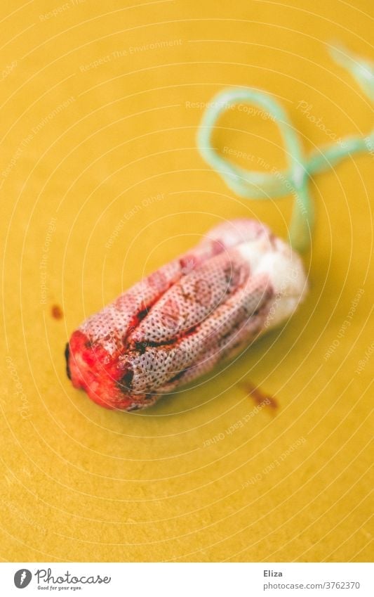 Bloody tampon on yellow background. Menstruation. Tampon bloody real Cycle feminine Red naturally reality Yellow Near menstruate period whether
