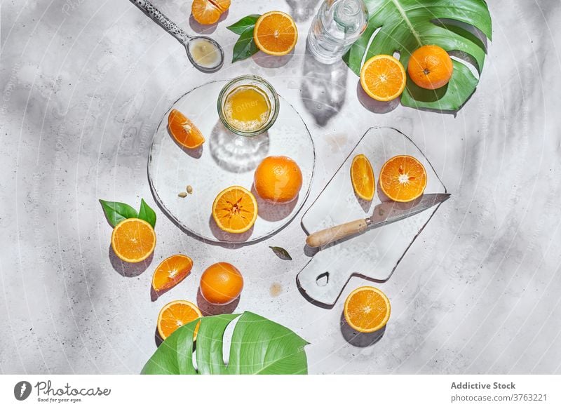 Delicious oranges for juice on table citrus arrangement prepare ripe knife glass fruit organic fresh vitamin ingredient nutrition bright vegetarian sweet