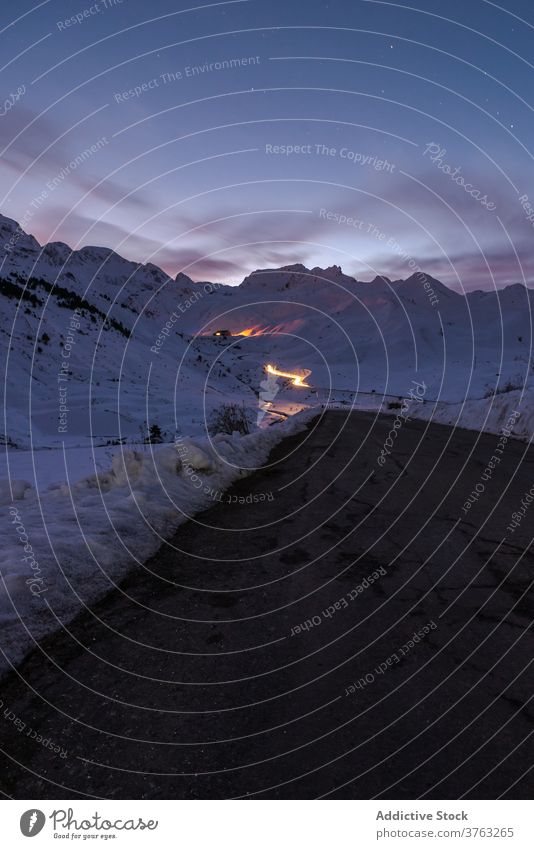 Amazing landscape of mountains in winter snow range night sky starry white season pyrenees huesca spain scenic scenery picturesque cold frozen tranquil majestic