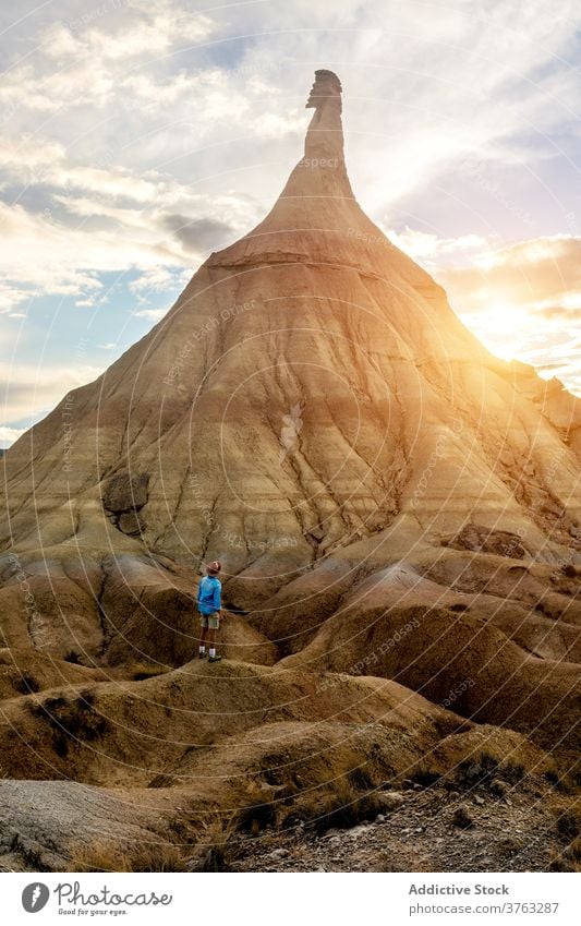 Male traveler in Bardenas Reales in summer bardenas reales man dried soil amazing scenery hill formation natural male navarra spain rocky nature landscape