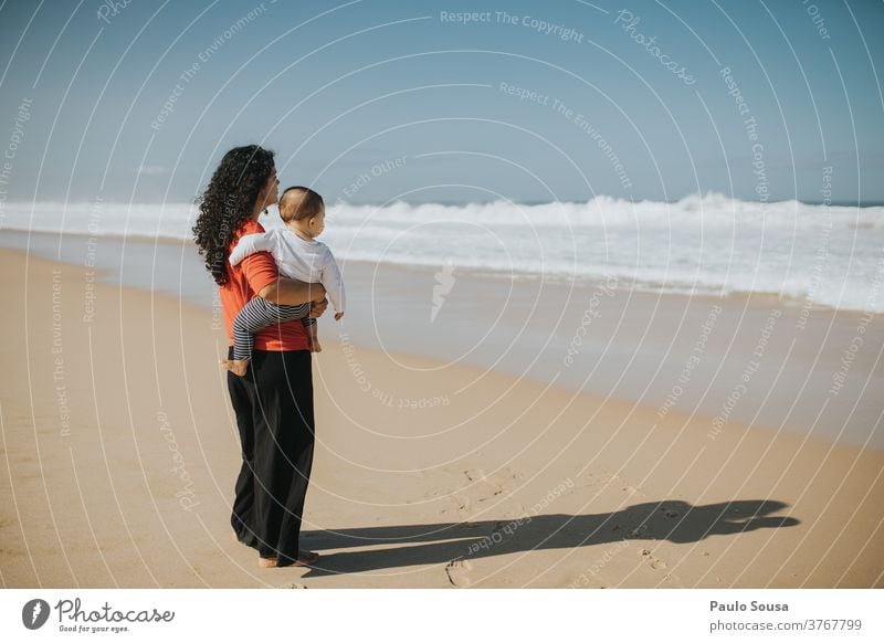Mother and son looking at sea motherhood Together togetherness Authentic Seasons SEA Ocean Atlantic Ocean Child Parents people Family & Relations Caucasian Love