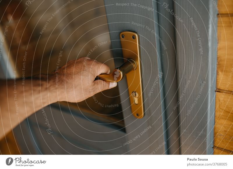 Close up hand opening door Close-up Hand Door Door handle Open Opening Front door Undo Old Entrance Deserted Colour photo Closed Detail Lifestyle Key