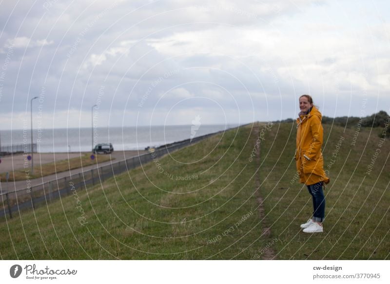 Woman on dike Dike Netherlands Landscape Sky coast