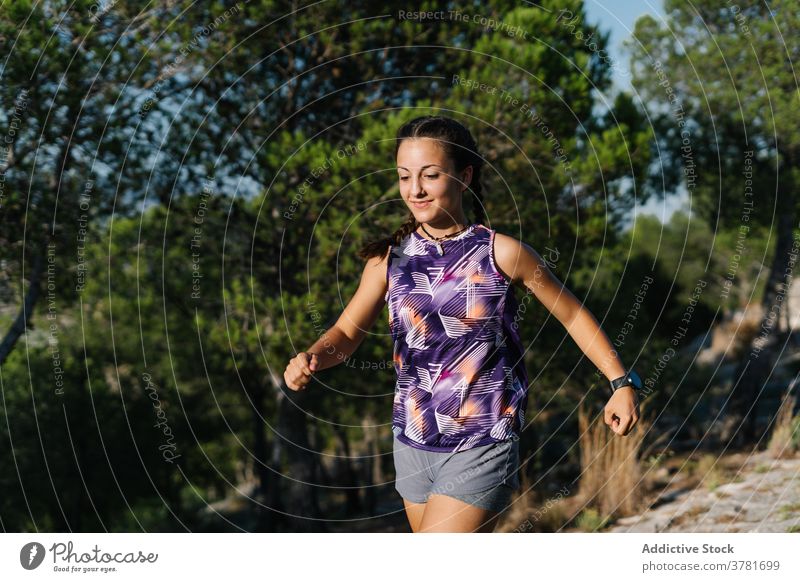 Young Beautiful Woman Jogging In Summer Park. Woman In Sport Outdoors  Health Concept Stock Photo, Picture and Royalty Free Image. Image 15037239.