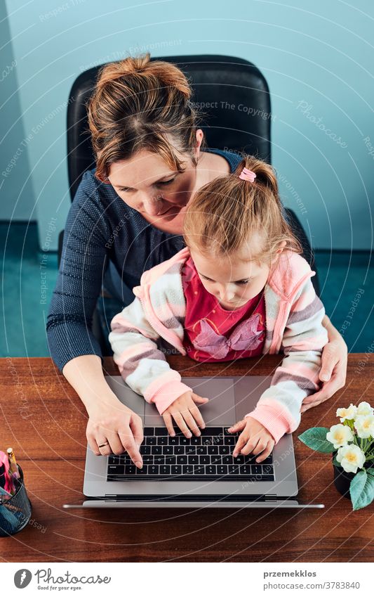 Little girl preschooler learning online solving puzzles playing educational  games on laptop at home - a Royalty Free Stock Photo from Photocase