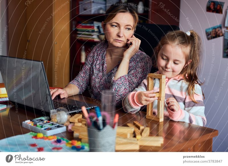 Little pre-school girl learns to solve puzzles online and plays educational  games on tablet at home - a Royalty Free Stock Photo from Photocase