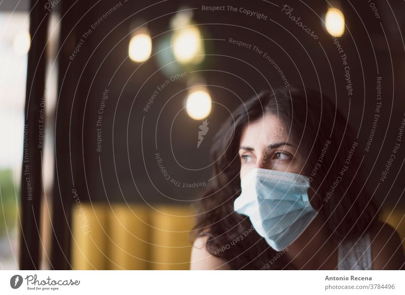 Woman portrait with surgical mask face covid-19 coronavirus pollution allergy person people one person protective corona virus mid adult 30s 30-35 years