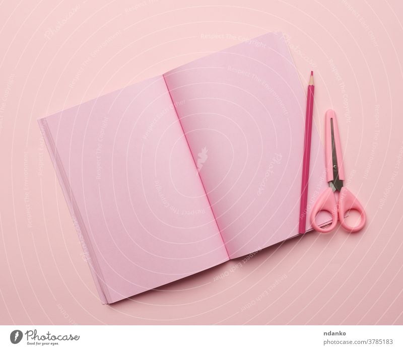 open notebook with blank pink pages on a pink background notepaper above clean concept design diary education empty flat goal lay list memo mockup notepad
