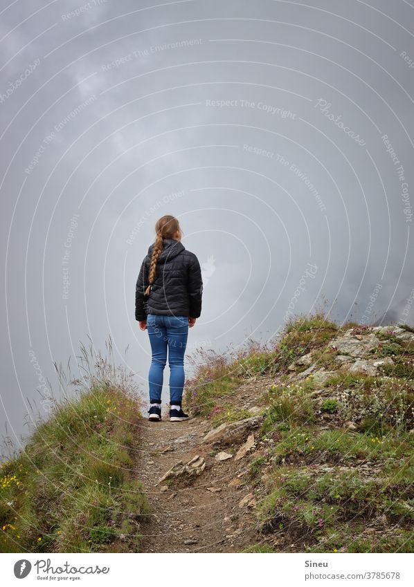 Girl on the edge Child by oneself Lonely Risk risky Danger of Life peril Fear Dangerous Fear of the future Loneliness silent tranquillity Slope Mountain