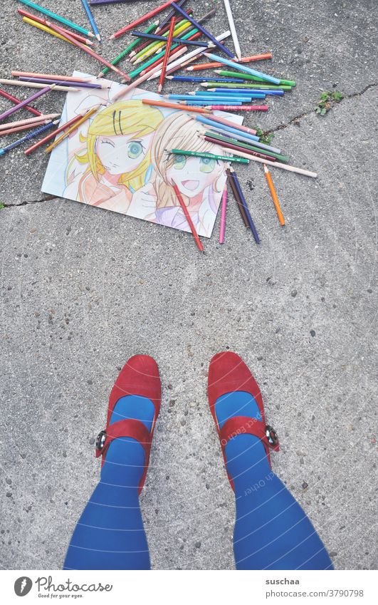 painted picture lies on the street with coloured pencils around it, woman stands beside it ... Image Painting (action, artwork) Draw Art artist pens crayons