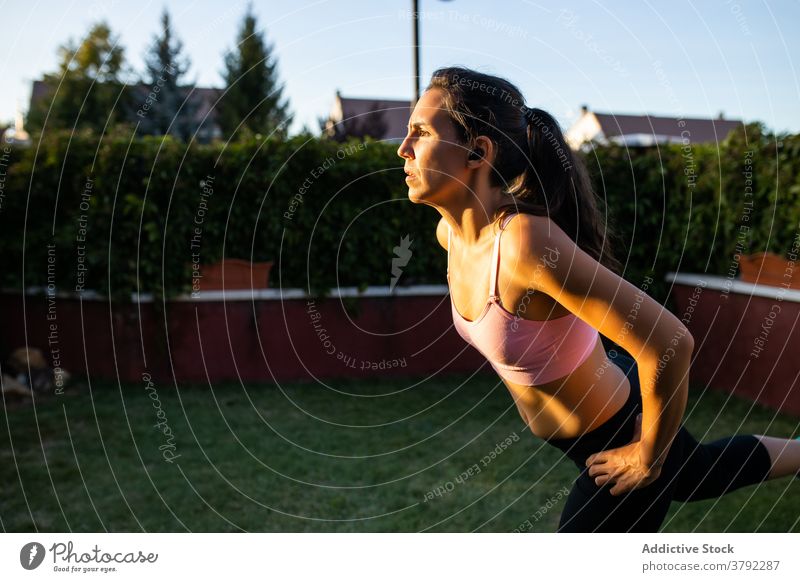 Pregnant woman doing exercises with dumbbells at home - a Royalty Free  Stock Photo from Photocase