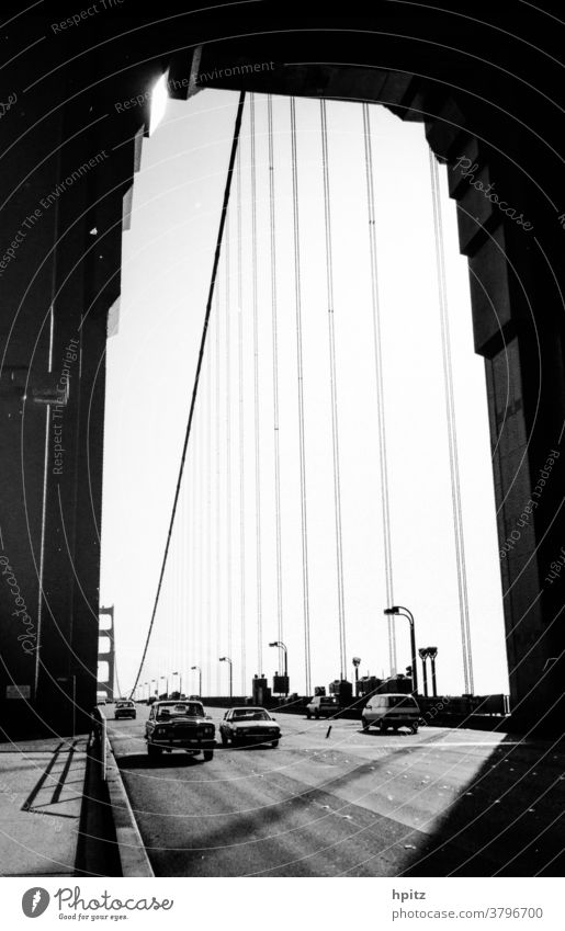 Golden Gate Transport Traffic infrastructure Light Black & white photo Golden Gate Bridge lines San Francisco USA