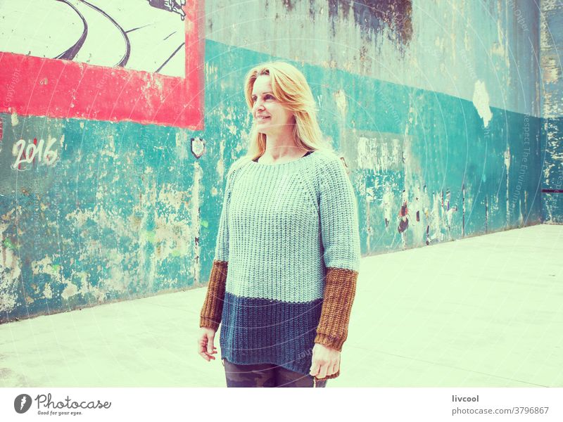 woman in the alley blonde nice smile smiling relax friend european calm people lifestyle lovely pretty spain basque country winter february sweater pullover