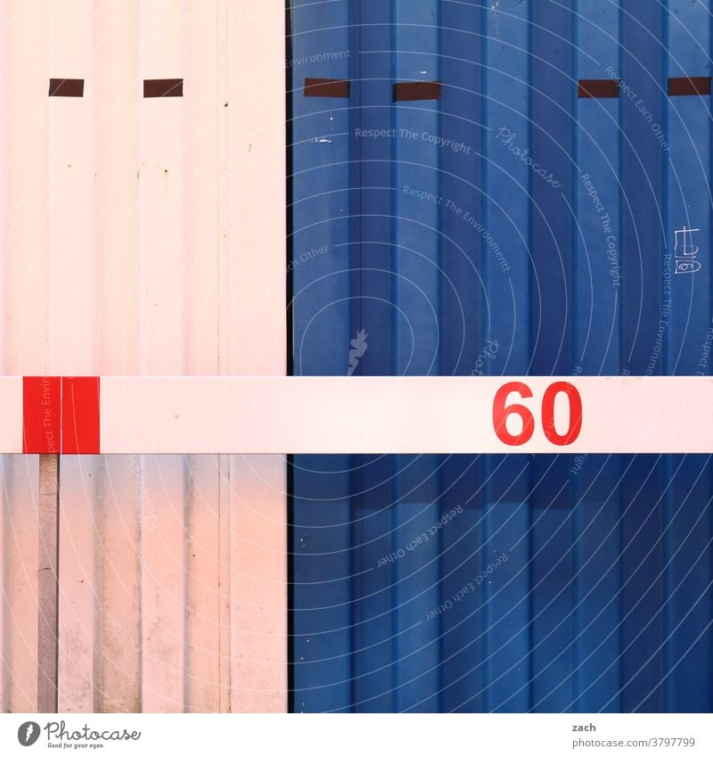60 Facade Wall (barrier) Wall (building) Manmade structures lines Container Blue White locked Closed sixty number Digits and numbers