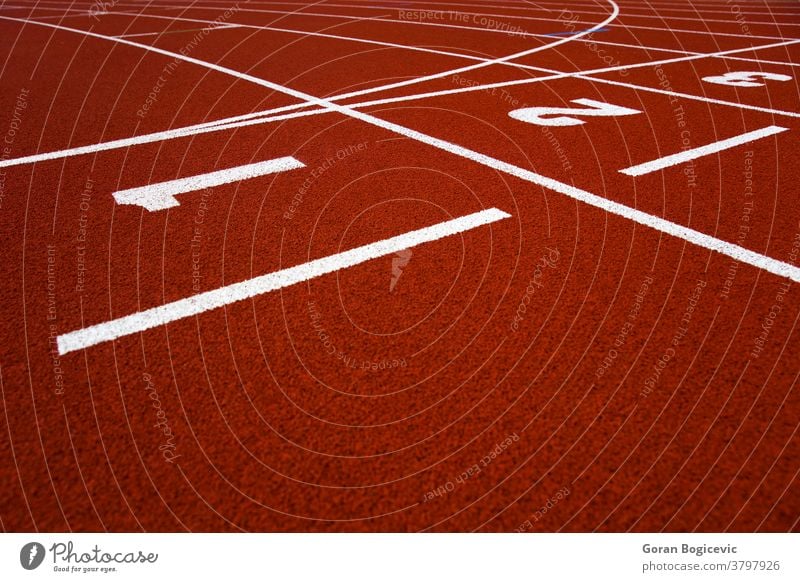 Red stadium running track closeup abstract arena athletic background competition course court day detail empty exercise field lane line lines nobody outdoor