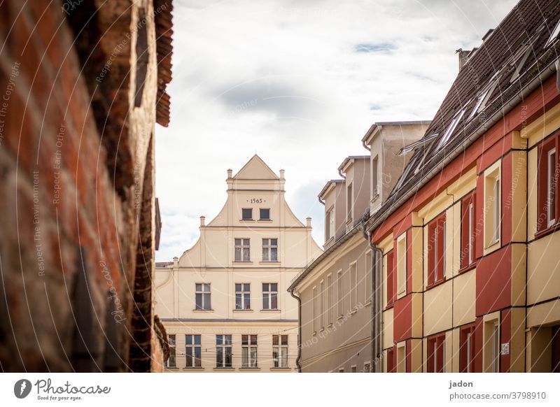 under the roofs of brb. Gable end pediment Facade House (Residential Structure) Exterior shot Deserted Wall (building) Building Window Architecture Sky Town Day