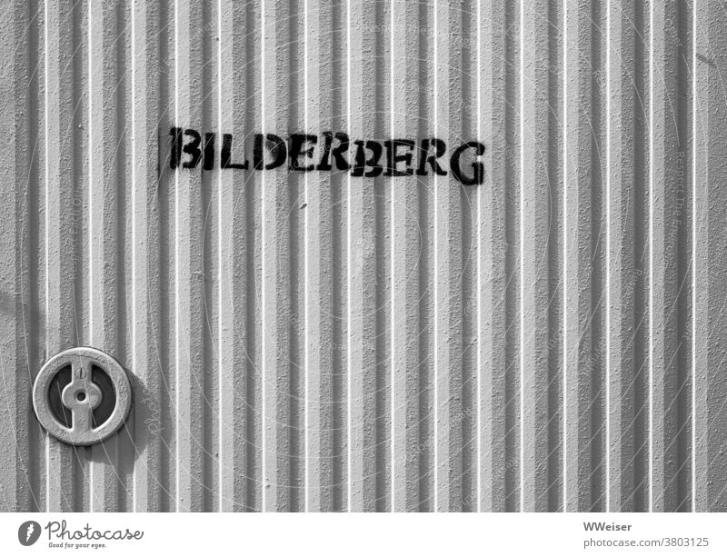 A big pile of pictures or a secret meeting of the mighty? bilderberg door Closure Cupboard Metal Safe locked conference organization meetings Conspiracy