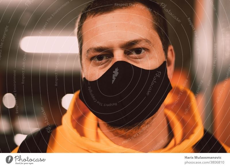 Man with face mask close up blonde bokeh celebrity competition corona coronavirus covid-19 epidemic garage infection male man man with mask men new normal