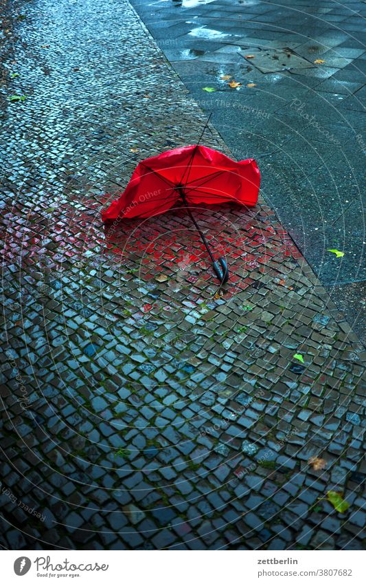 Umbrella in the rain Berlin broken Capital city Autumn rear building Broken Rain Umbrellas & Shades Schöneberg Town Street street photography Scene urban Doomed