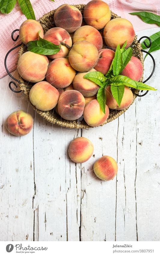 Ripe juicy peaches on a rustic background fruit food healthy fresh agriculture diet organic summer raw red sweet nectarine ripe group nutrition vitamin harvest