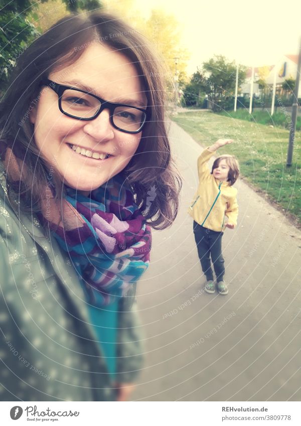 Selfie from a mother and son Woman Exterior shot Human being Cellphone Smiling Easygoing Adults Happy pretty portrait Joy Lifestyle Child To go for a walk